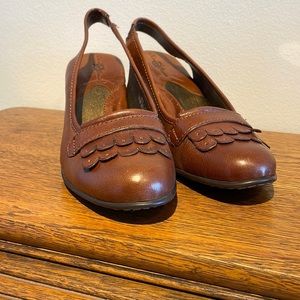 Born dark brown, sling back shoes